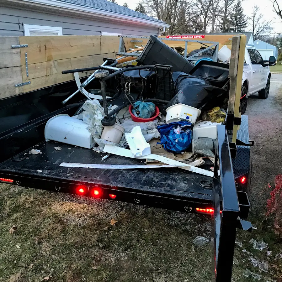 Roll-off dumpster delivered to a residential driveway in Presque Isle