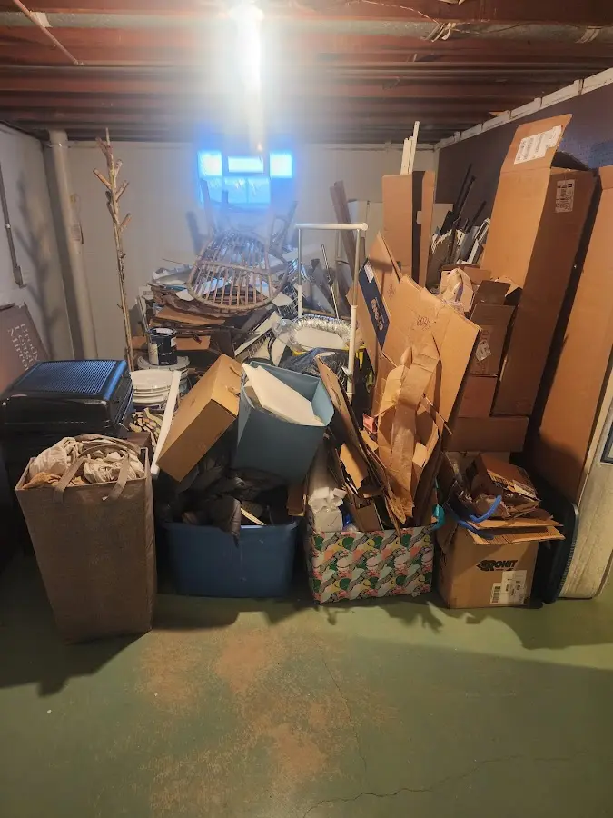 Roll-off dumpster container at job site for 6 Yard Dumpster Rental in Presque Isle